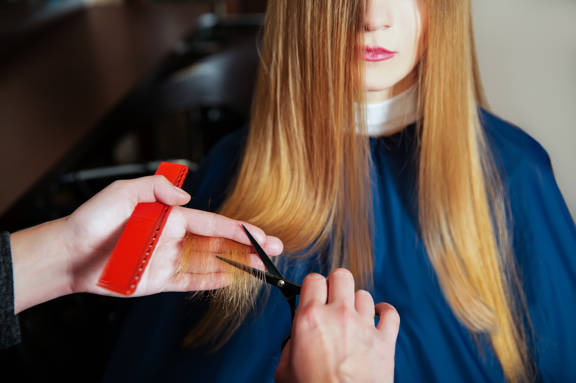 Hairdresser with scissors and comb